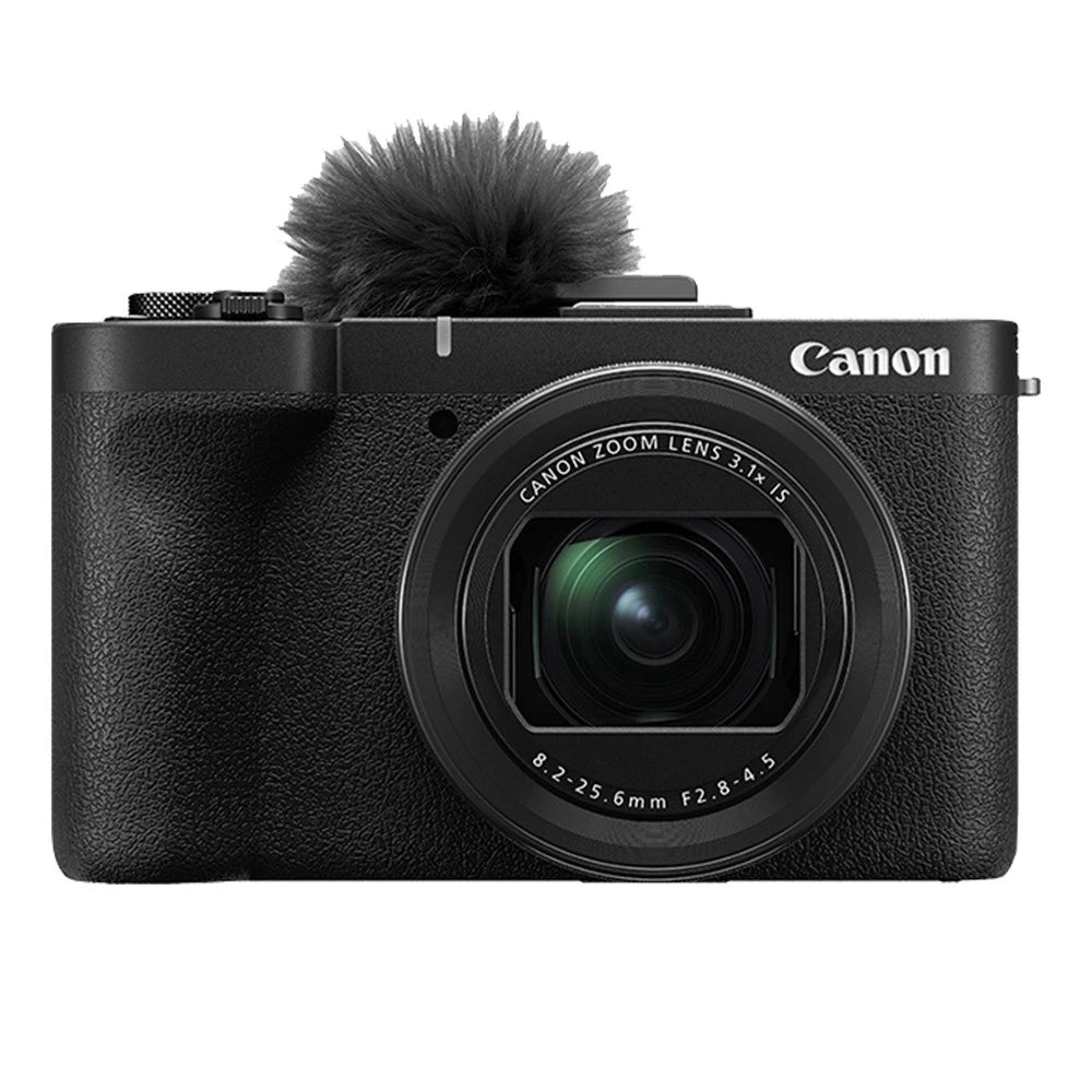 Canon camera with microphone on a white background