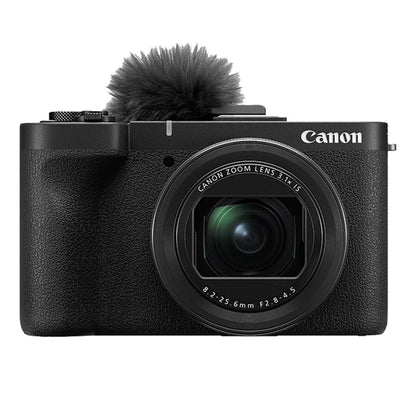 Canon camera with microphone on a white background