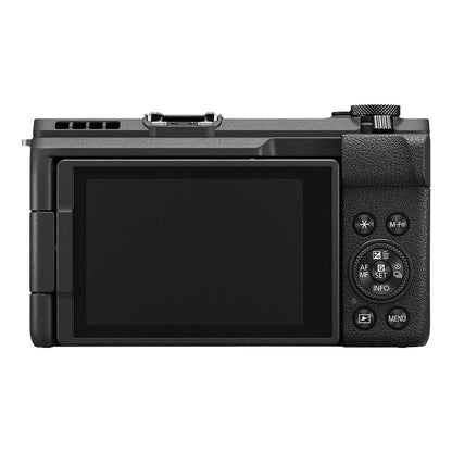 Black digital camera with screen and control buttons on a white background